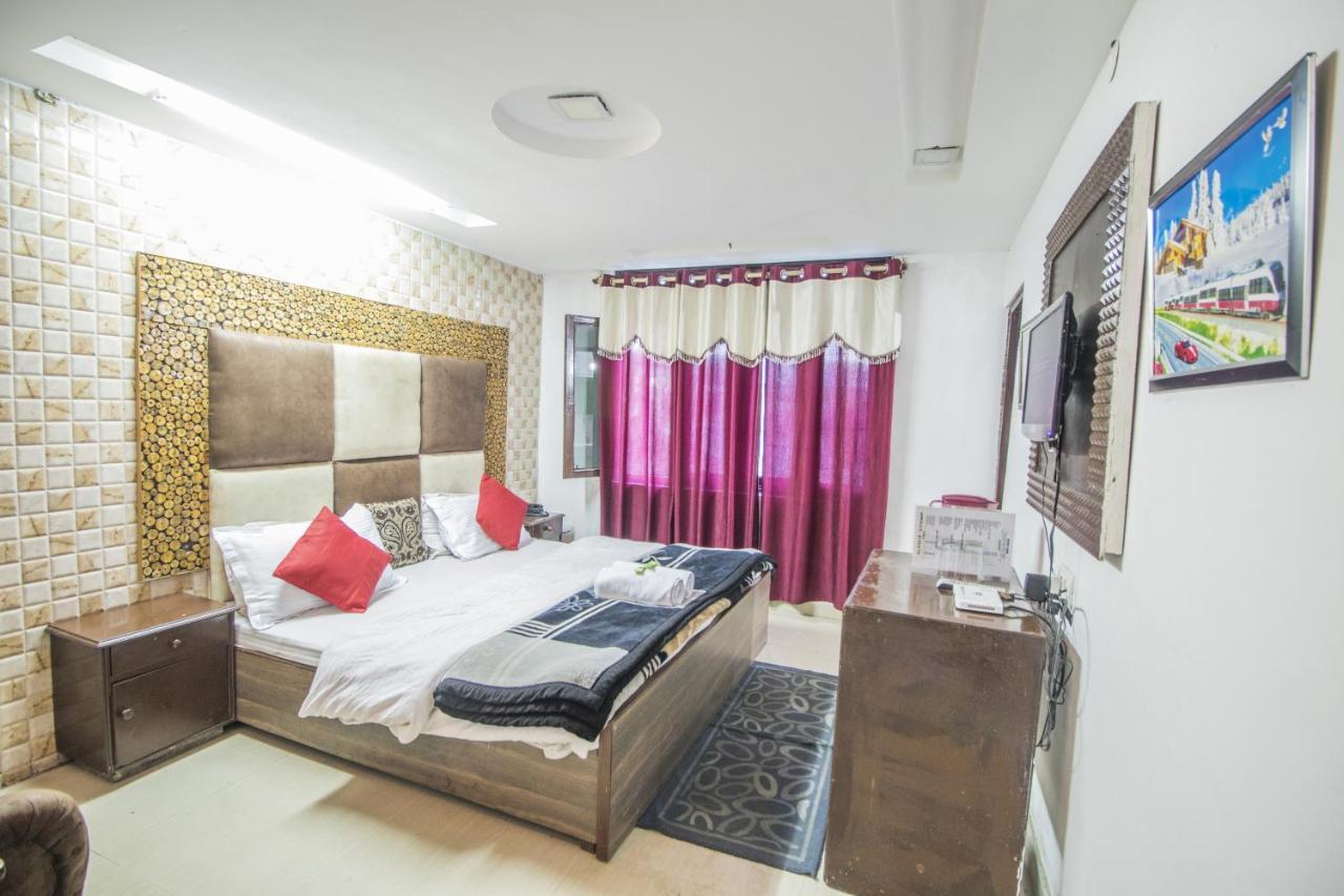 Holiday Plaza Hotel ดัลเฮาซี ภายนอก รูปภาพ